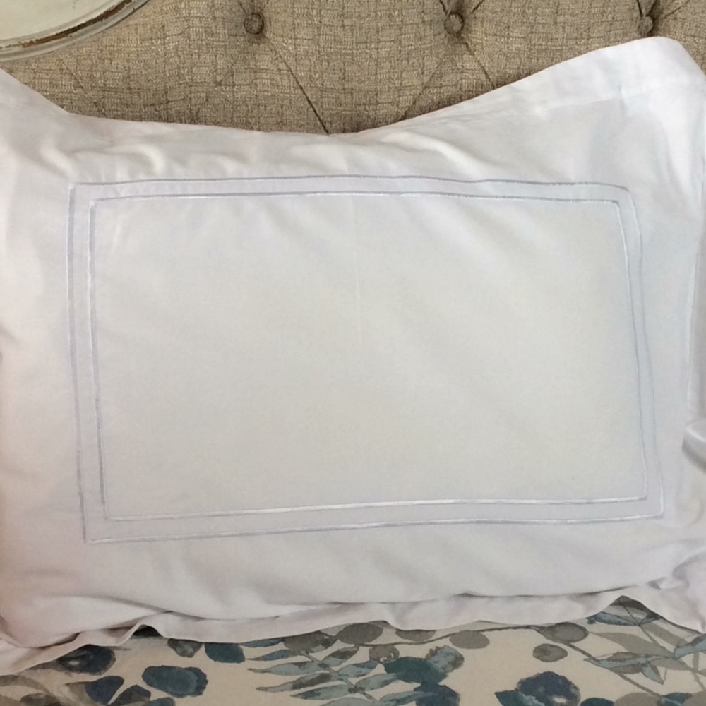 White pillow shams with decorative trim SOLD